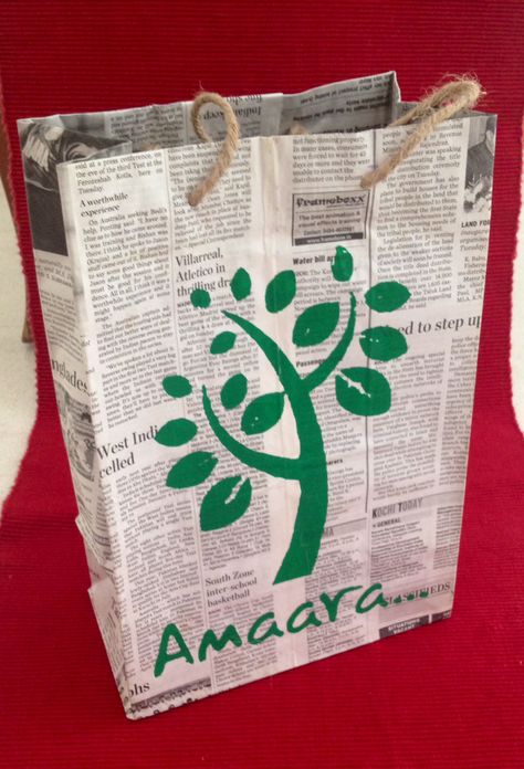 the Amaara newspaper bag. screen printed Paper Bag Decoration, Environment Activities, Newspaper Bags, Recycling Crafts, Newspaper Paper, Recycle Newspaper, Paper Bag Design, Bag Decoration, Eco Design