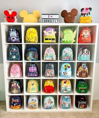 Instagram • Chats Disney Loungefly Backpack Display, Casa Disney, Loungefly Purse, Mistletoe And Wine, Disney Character Art, Disney Rooms, Rainbow Room, Loungefly Bag, Holiday Bag