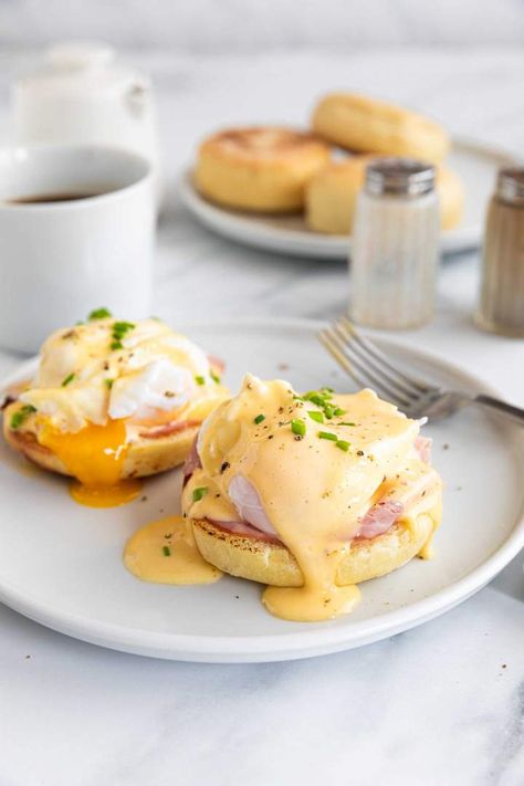 The Best Eggs Benedict is a simple, yet fancy breakfast recipe that you will love. Poached eggs with easy homemade hollandaise sauce, ham, and English muffin. Learn how to make the best eggs Benedict for 2 following this straightforward recipe and recipe video. #eggsbenedict #breakfastrecipe #breakfastideas #breakfastdate #breakfastfortwo Mold Recipes, Quick Recipe Videos, Homemade Hollandaise Sauce, Eggs Benedict Recipe, Fancy Breakfast, Egg Recipes For Breakfast, Hollandaise Sauce, Egg Bites, Boiled Egg