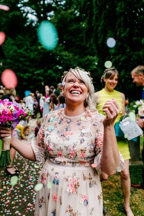 happy smiling bride in a non traditional non white bridal gown. in soft beige with 3d floral applications. Quirky Wedding Dress, Quirky Bride, Unusual Wedding Dresses, Nontraditional Wedding Dress, Kent Wedding, Boda Mexicana, Alternative Wedding Dresses, Quirky Wedding, Natural Wedding Photography