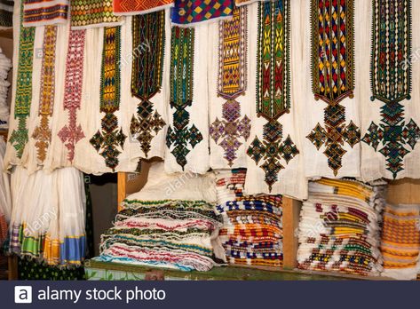 Ethiopia, Tigray, Axum (Aksum), town centre, traditional clothing shop, with hand embroidered dresses on sale Stock Photo Ethiopia Clothing, Ethiopian Clothing, Dashiki Shirt, Habesha Kemis, Ankle Length Dress, Handmade Scarves, Traditional Attire, Ethiopia, Embroidered Dress