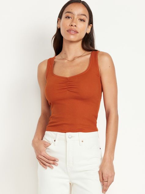 scoop neck wide straps cinched front lace trim fitted hits below waist models are approx.  5'9" and wear sizes s (4), l (12), and xl (18)machine wash according to the care instruction label Sweater Tank Outfit, Charm Bracelet Watch, Knitted Crop Tank Top, Orange Tops, Tank Outfit, Chic Pants, Feminine Blouses, Crop Tank Top, Sweater Tank