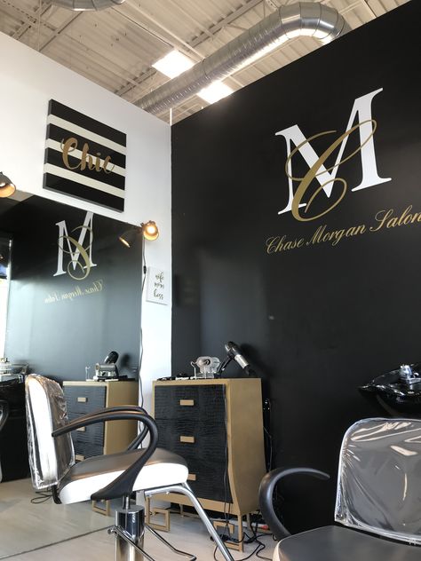 Black White And Yellow Hair Salon, Black Wall Salon Decor, Black White And Gold Salon Suite, Black Gold Salon Decor, Black White And Gold Salon Suite Ideas, Black And Gold Nail Salon Decor, Small Home Hair Salon, Salon Feature Wall Ideas, Salon Suite Decor Small Spaces Glam