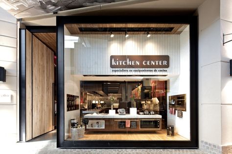 Built by Nicolás Lipthay | Kit Corp in Quilicura, Chile with date 2010. Images by Nicolás Saieh. Kitchen Center, specialist in kitchen equipment, decided to enter the competitive market of mall retail. This is why ... Retail Facade, Shop Facade, Bar Exterior, Storefront Design, Retail Inspiration, Kitchen Showroom, Kitchen Concepts, Shop Fronts, Shop Front Design