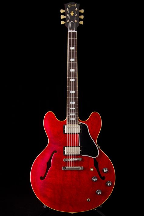 The semi-hollow-body Gibson ES-335, in cherry red -- a classic with blues players and rockers including Chuck Berry and Keith RIchards Semi Acoustic Guitar, Gibson Electric Guitar, Gibson Guitar, Archtop Guitar, Cool Electric Guitars, Guitar Center, Chuck Berry, Gibson Guitars, Classic Guitar