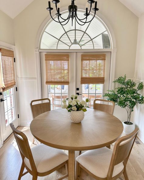 Small refresh of our kitchen nook area featuring our Canyon Sand Round Dining Room Table and Chairs from the Drew & Jonathan for @roomstogo collection. #roomstogoambassador I switched up the picture and table decor in here for spring, but kept it minimal as this table doesn’t need much decor to stand out - it’s a show stopper by its self! I really love the light-colored sand finish and open pedestal design, and the matching wood-back chairs with the neutral white upholstered fabric are perf... Small Round Dining Table Pedestal Kitchen Nook, Small Round Dining Table, Dining Room Table And Chairs, Round Dining Room Table, Inspirational Board, Round Dining Room, Dining Room Colors, Colored Sand, Kitchen Nook