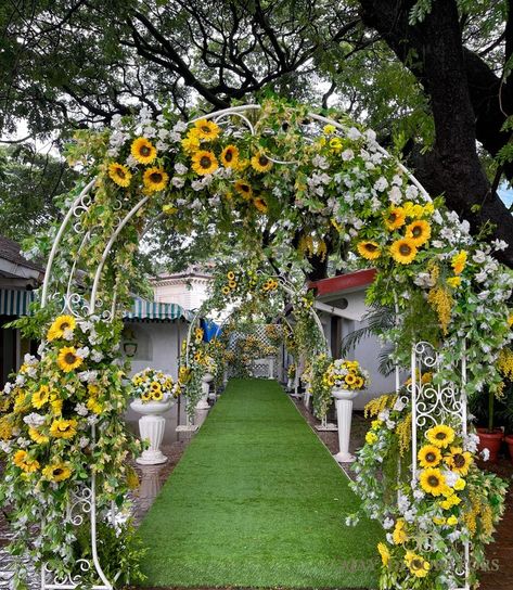 #welcomedecor #entrancedecor #decor #decorators #weddingdecor #weddings #indianwedding #bigfatindianwedding #mumbaiwedding #love #lovestory #setlife #weddingdecor #wedmegood #weddingideas #weddinginspiration #weddinginspo #props #welcomeboarddecor #props #floraldesign #mahalakshmi #turfclub #sunflowers #explore #couple #propping #florals #ajaydecorators Sunflower Indian Wedding Decor, Outdoor Stage Decorations Wedding, Haldi Theme, Floral Mandap, Baat Pakki, Sunflower Arrangement, Sunflower Theme, Mumbai Wedding, Wedding Stage Decor