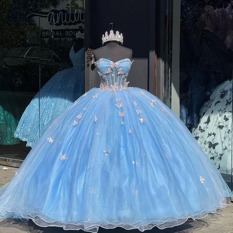 Blue Dress Ball Gowns, Quince Chambelanes Outfits Light Blue, Blue 15 Dresses, Blue Fluffy Dress, Pink And Blue Quinceanera Dresses, Winter Wonderland Quinceanera Dress, Baby Blue Butterfly Quinceanera Theme, Quince Dresses Light Blue, Baby Blue Quince Dresses