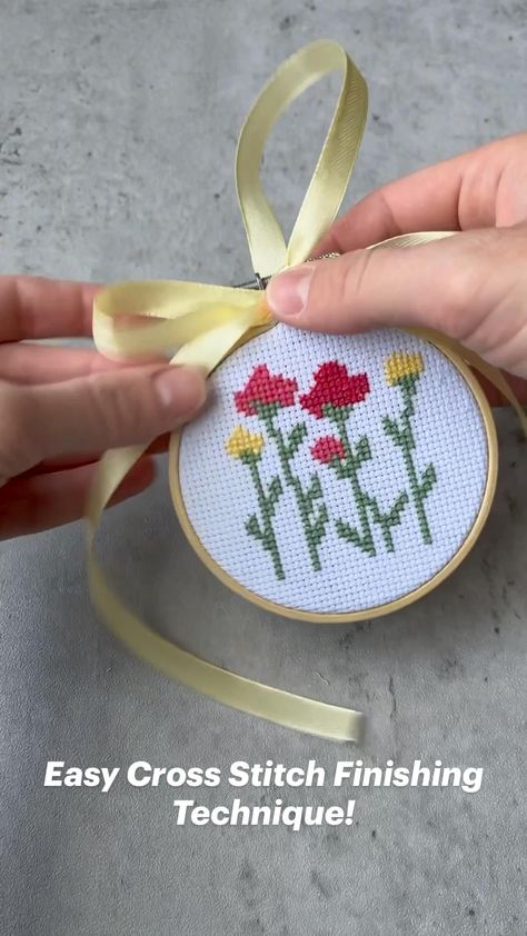 Easy Cross Stitch Finishing Technique! | Cross stitch, Simple cross stitch, Cross stitch flowers . #Cross_Stitch #Cross_Stitch_Hoop #Finished_Cross_Stitch #Easy_Cross_Stitch Cross Stitch With Buttons, Hanging Cross Stitch, Embroidery Hoop Finishing Ideas, Mounting Cross Stitch Ideas, Cross Stitch Christmas Presents, Diy Cross Stitch Christmas Ornaments, Double Hoop Cross Stitch, 20x20 Cross Stitch Pattern, Cross Stitch Items To Sell