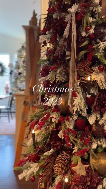 Louisa on Instagram: "Christmas 2023✨ Snowy flocked branches covered in dark red, burgundy, brown and bronze tones for my family room tree. I’m just waiting on some cluster twinkle lights to arrive, then it will be done. I hope you all have a wonderful week and a Happy Thanksgiving 🦃 . . #christmastrees #christmasdecorations #christmasmood #christmasvibes #christmascountdown #christmasornaments #vintagechristmas #cozyhome #howiholiday #holidayhome #nostalgicchristmas #cottagecore #cottagestyle" Red Christmas Tree Flocked, Brown Burgundy Christmas Tree, Brown And Burgundy Christmas Tree, Red And Brown Christmas Decor, Burgundy And Brown Christmas Tree, Brown And Red Christmas Decor, Red And Burgundy Christmas Tree, Brown And Red Christmas Tree, Red And Brown Christmas Tree