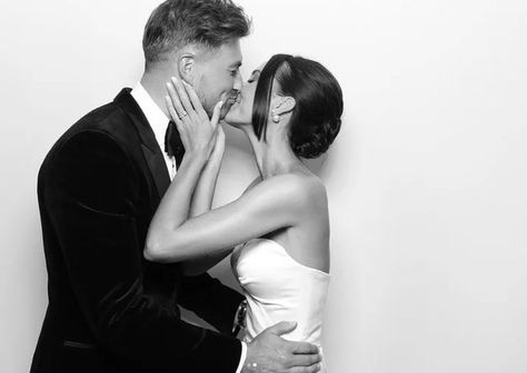 Photo of bride and groom kissing. Bride is holding the grooms face. Image is black and white from viva la booth photobooth hire Photo Booth Wedding Black And White, Black And White Photobooth Pictures, Luxury Photobooth, Reception Portraits, Black And White Photo Booth, Photobooth Poses, Wedding Packages Prices, Leather Guest Book, Grad Shoot