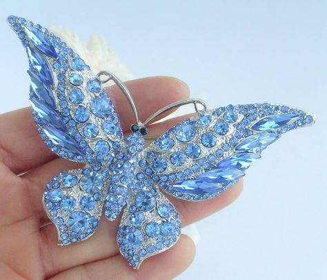 Hello Everyone! This is our popular blue rhinestone crystal butterfly Brooch, the size is about:9.5cm (3.74")x 6.0cm(2.36"),silver tone plated and there is a loop on the back side of this brooch. We have several other colors for this butterfly Brooch. #butterflybrooch #butterflypin #bluebutterflybrooch #insectbrooch#animalbrooch #animalpin #animal pendant #Broochforwomen #Rhinestonebrooch #CrystalBrooch #PendantBroachPin #CostumeBrooch #JewelryForwomen Pretty Butterfly, Butterfly Pin, Crystal Butterfly, Animal Brooch, Pin Pendant, Rhinestone Bridal, Butterfly Jewelry, Butterfly Brooch, Crystal Brooch