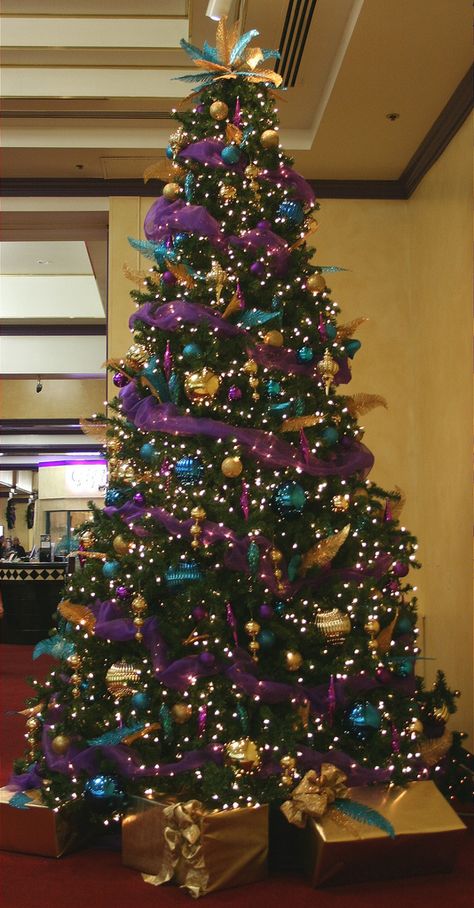 Purple & Gold16ft Decorated ChristmasTree | by Christmas Specialists Purple Christmas Tree, Peacock Christmas, Gold Decorations, Christmas Tree Inspiration, Purple Christmas, Cool Christmas Trees, Beautiful Christmas Trees, Gold Christmas Tree, Christmas Tree Design