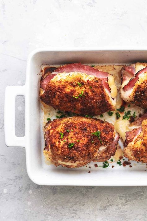 overhead view of four chicken bundles in a casserole dish Best Chicken Cordon Bleu Recipe, Chicken Cordon Bleu Sauce, Dijon Cream Sauce, Ham Fried Rice, Ham And Bean, Cordon Bleu Recipe, Chicken Cordon Bleu Recipe, Cordon Blue, Winter Picnic