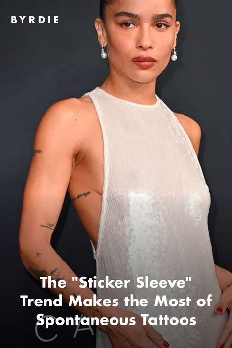 Zoe Kravitz on the red carpet with her sticker sleeve tattoo arm Arm Sticker Sleeve Women, Unique Sticker Sleeve Tattoo, Feminine Sticker Sleeve, Sticker Tattoo Arm Sleeve, Arm Sticker Tattoo, Sticker Arm Tattoo, Small Tattoo Sleeve Style, Sticker Sleeve Tattoos For Women, Scattered Tattoos Sleeve Women