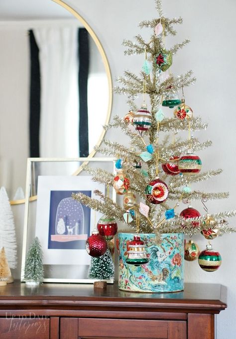 A eclectic and color Christmas home with lots of globally inspired DIYs and decorating ideas!   #modernglobaldecor #globaleclecticdecor #diybloggershouse #eclecticglobal #diyhomedecoronabudget #christmasdecor #christmasdecorationideas Vintage Eclectic Christmas Decor, Modern Vintage Christmas Decor, Tabletop Christmas Tree Ideas, Colourful Christmas Decorations, Anthropology Christmas, Eclectic Christmas Decor, Vintage Inspired Christmas Tree, Eclectic Christmas, Vintage Inspired Christmas Decor