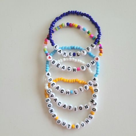 Custom Seed Bead Name Bracelet Set. Each Set Comes With 5 Bracelets For $27. Strung On Strong Stretch Cord. Brand New Condition. Ships Next Business Day Offers Are Welcome Personalize Your Stack With Your Favorite Summer Phrase, Your Name, Special Date, Or Occasion. Message Me With Your Desired Size, Color, And What You Want Your 5 Bracelets To Say. Choose From All The Colors Pictured Above. Sizes: Xs 6", S 6.5", M 7", L 7.5", Xl 8" Example 1) Name Melissa, Color White, Size 7 2) Names Ava Nora Word Bracelets Beads, Friendship Bracelet Patterns With Beads, Bracelet Sayings, Buissnes Ideas, Seed Beaded Bracelets, Name Bead Bracelet, Bead Styles, Word Bracelets, Bracelet Business