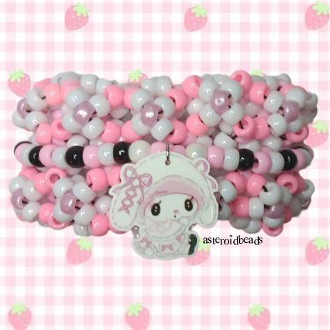 my melody charm 3d rotating kandi cuff! 🩷🌸❤️🌸🧡🌸💛🌸💚🌸💙🌸💜 🎀 available on all my shop links! ♡ check out my page for tons of other kandi + jewelry pics >:3 ♡ handmade with love by me! ♡ freebies with every order! thank you for your support <33 🩷🌸❤️🌸🧡🌸💛🌸💚🌸💙🌸💜 shares are greatly appreciated! you are helping me grow my small business <3 PLUR!! 🫶🌈 #kandi #kandicuff #kandikid #kandiraver #beadedbracelet #beadbracelets #kidcore #scenecore #dreamcore #pinkcore #kawaii #decora #fairykei #mymelody #s... Small Kandi Cuff, My Melody Kandi, Rotating Kandi Cuff, Kandi Charms, Kandi Jewelry, Jewelry Pics, Kandi Inspo, Diy Kandi Bracelets, Diy Kandi