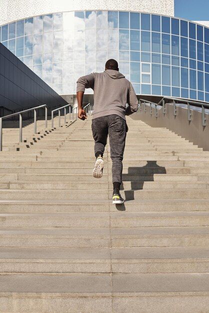 Photo man running outdoors up stairs | Premium Photo #Freepik #photo #man-exercise #man-jogging #active-lifestyle #running-sport Running Up Stairs, Man Exercise, Up Stairs, Person Running, Running Photos, Model Shoot, Beautiful Red Roses, Man Go, Running Man