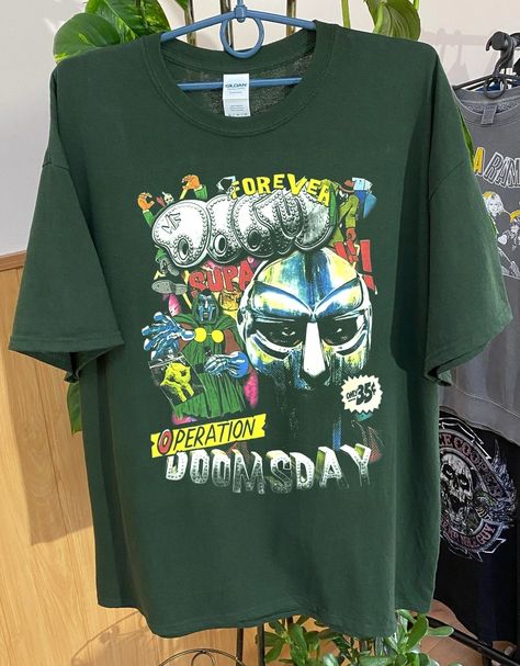 Retro Mf Doom 90S Hip Hop Rapper Long Sleeve Check more at https://customizationtrend.com/retro-mf-doom-90s-hip-hop-rapper-long-sleeve-8124/ Mf Doom Merch, Mf Doom Shirt, Mf Doom T Shirt, Characters Outfits, Gift For Your Bestie, Hip Hop Sweatshirts, Country Music Shirts, Thrift Inspo, Mf Doom