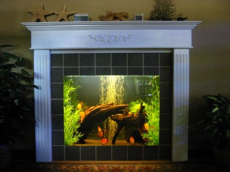 Fireplace Aquarium, Unused Fireplace Ideas, Exposed Brick Chimney, Brick Chimney Breast, Garden Aquarium, Unused Fireplace, Exercise Rooms, Aquarium Store, Tv Entertainment Center