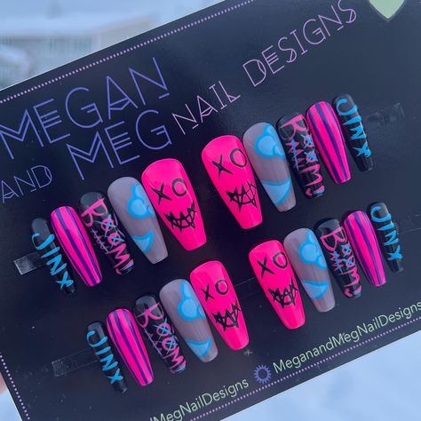 Absolutely obsessed with these Jinx-inspired nails! 🎀💥 The bold colors, edgy details, and those adorable cloud tattoos—everything screams chaos and charm! 💙💖 What’s your favorite detail? #JinxNails #arcanenails #CustomNailArt #arcanejinx Jinx Inspired Nails Arcane, Jinx Themed Nails, Chaotic Nail Designs, Law Nails One Piece, Jinx Arcane Nails Design, Jinx Arcane Acrylic Nails, Arcane Jinx Inspired Nails, Jinx Nails Design, Arcane Nails Ideas