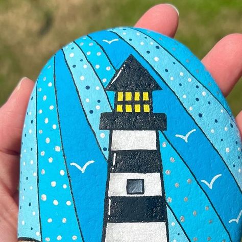 Painted Rock Lighthouse, Sailboat Rock Painting, Rock Painting Lighthouse, Beach Theme Painted Rocks, Happy Stone, Rock Faces, Happy Rock, Beach Art Painting, Rock Boots