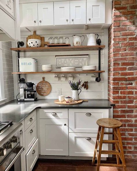 High End Kitchen Cabinets, Open Shelving In The Kitchen, Kitchen Open Shelving Ideas, Kitchen Open Shelving, Industrial Pipe Shelf, Brick Feature Wall, Pipe Shelf, White Tableware, Industrial Pipe Shelves