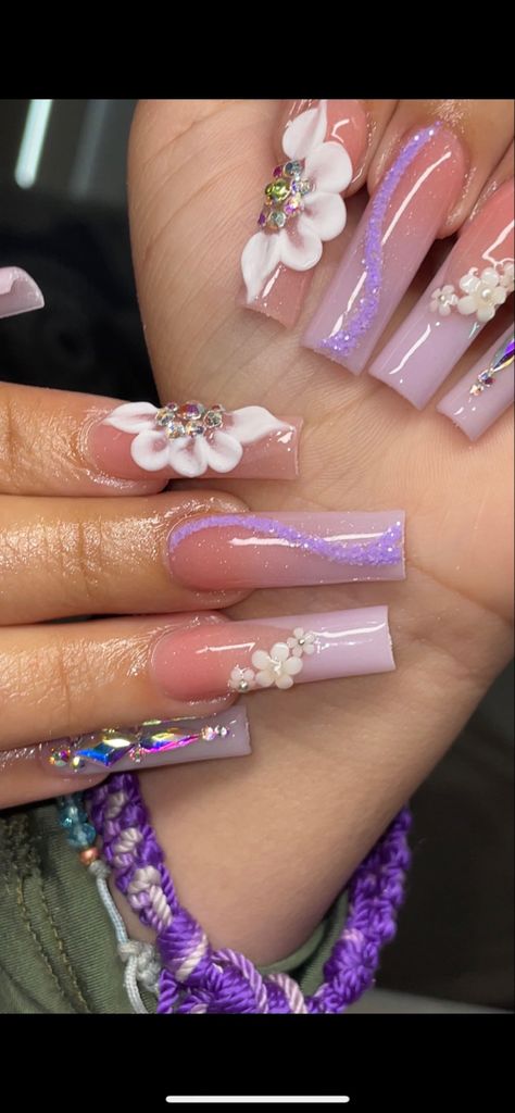 Long purple flower nails Purple Nails For A Wedding, Purple Nails For Quinceanera, Purple 15 Ideas, Purple Set Nails, Homecoming Nails For Purple Dress, Acrylic Nails In Purple, Purple 15 Makeup, Tangled Quince Makeup, Lavender Quince Nails Short