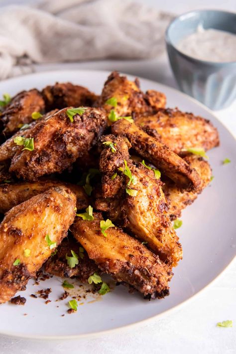 From game days to family dinners, there’s never a bad time to make air fryer chicken wings with dry rub! They have the perfect amount of Cajun flavor and a satisfying crunch. Sweet Chili Wings Recipe, Bourbon Chicken Wings Recipe, Seasoned Wings, Best Air Fryer Chicken Wings, The Best Air Fryer Chicken, Breaded Chicken Wings, Best Air Fryer Chicken, Garlic Lime Chicken, Delicious Air Fryer Recipes