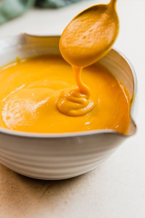 This dairy-free cheese sauce is simply the best! It's made with lots of vegetables, and zero cashews for a nut-free cheese sauce that's perfect for dipping, drizzling, and pasta sauce. Aip Cheese Sauce, Paleo Cheese Sauce, Aip Dips, Dairy Free Cheese Sauce, Aip Condiments, Aip Sauces, Basic Cheese Sauce, Aip Dinner, Mac And Cheese Sauce