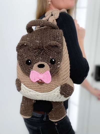 Hi there! I’m so excited to introduce you to the Cuddles – The Caring Bear Crochet pattern. This adorable backpack is the perfect companion for carrying all of your burdens so you can keep joy in your heart. The heart-shaped … Read More... Backpack Crochet Pattern, New Crochet Patterns, Backpack Crochet, Bear Crochet Pattern, Bear Backpack, Rainy Day Crafts, Bear Crochet, Crochet Backpack, Backpack Pattern