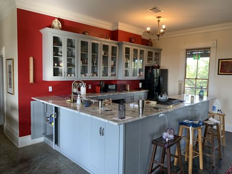 A beautiful kitchen remodel with bold red walls and painted gray cabinets. Red Wall Kitchen, Painted Gray Cabinets, Red Kitchens, Red Kitchen Walls, Color Cabinets, Kitchen Color Red, Restaurant Designs, Light Blue Kitchens, Dark Grey Kitchen