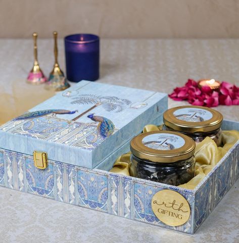 Celebrate in style with our most elegant traditional Blue Peacock tray hamper! 🤩🤩 Featuring a Jar of Salted Cashews, a Jar of Salted Almonds, 6 Cracker Chocolates, 5 Truffle Balls, and 4 Laddu Candles, this beautiful combination of dry fruits and sweets is perfect for festive gifting. 💫💫 Customizable for bulk corporate orders, priced at just INR 1700/- ✅ #diwaligifts #diwalihampers #byob #arthgiftings #diwalidecor #corporategifts #affordablediwaligifts #giftboxes #delhi #indirapuram Truffle Balls, Salted Cashews, Salted Almonds, Blue Peacock, Dry Fruits, Diwali Gifts, Diwali Decorations, Dried Fruit, Corporate Gifts