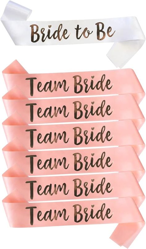 Bride To Be Sash White sashes with gold lettering that reads "Bride to Be". Our bride to be sash is made of double face satin fabric, which features smooth silk tactility, super appealing and elegant.

Team Bride Sash Rose Gold sashes with gold lettering that reads 'Team Bride'. Our team bride sash is made of double face satin fabric, which features smooth silk tactility, super appealing and elegant. Team Bride Ideas, Bach Party Sashes, Bachelorette Sashes Funny, Hen Do Sash, Bridal Party Sashes Bachelorette, Sash Bachelorette, Bride Sash, Hen Party Sash, Hen Ideas