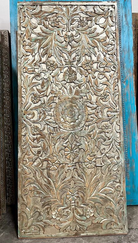 The grand foyer sets the tone with a striking row of carved doors, immediately captivating guests with their intricate designs and craftsmanship. https://mogulgallery.etsy.com #slidingbarndoors #statementdoors #teakdoors #treeoflifedoor #vintagedoors #vintageindiandoor #vintageindiandoor #vintagerusticdoor #whitewashdoor #yogastudiodoor Library Doors, Boho Rustic Home, Doors Room, Reclaimed Wood Door, Carved Wall Art, Lotus Garden, Custom Barn Doors, Eclectic Farmhouse, Textile Tapestry