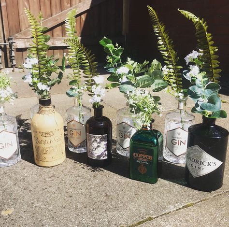 Wedding Centerpieces With Bottles, Bottle Decoration Ideas Wedding, Bottle Centrepiece, Alcohol Bottle Centerpieces Wedding, Alcohol Bottle Decorations Wedding, Spirit Bottle Centrepiece, Liquor Bottle Wedding Centerpieces, Bottle Wedding Centerpiece, Bottle Wedding Decor