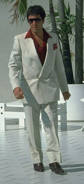 Scarface: Tony’s White Pinstripe Suit | BAMF Style Montana Style, Tony Montana, White Suit, Al Pacino, Check It Out, Montana, Timeless Elegance, Red, White