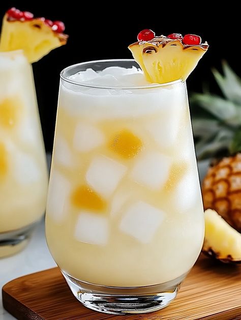 This refreshing Pina Colada Punch recipe is perfect for summer parties! Made with pineapple juice, coconut cream, and rum, it's a tropical drink everyone will enjoy. Serve chilled over ice for a taste of paradise. Pina Colada Punch Recipe, Pina Colada Punch, Bbq Favorites, Juice Coconut, Punch Recipe, Summer Gathering, Tropical Drink, Punch Recipes, Summer Bbq