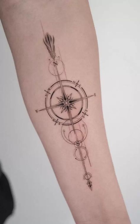 Compass Tattoos: Meanings, Tattoo Styles & Tattoo Ideas Arrow And Compass Tattoo, Compass Arrow Tattoo, Compas Tattoo, Mandala Compass Tattoo, Traditional Compass Tattoo, Compass Arrow, Anchor Compass Tattoo, Arrow Compass Tattoo, Feminine Compass Tattoo