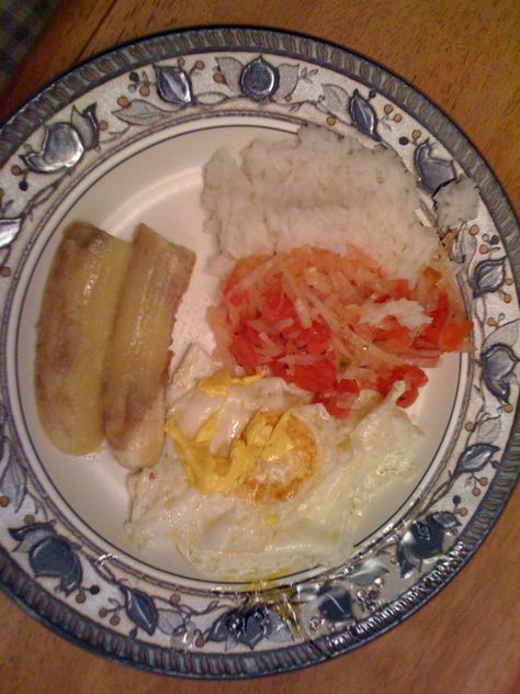 Cuban Style Rice with Fried Eggs and Bananas - Mommy Travels Rice Egg, Cuban Style, Fried Bananas, Fried Eggs, What's For Breakfast, 6k Followers, Fried Egg, Yummy Recipes, Bananas