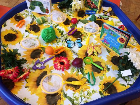 Tuff tray for Very Hungry Caterpillar theme. Sunflower pattern from a tablecloth. Sunflower Tuff Tray, Butterfly Life Cycle Tuff Tray, Butterfly Tuff Tray, Mini Beasts, Sunflower Theme, Butterfly Room, Tuff Tray, Butterfly Life Cycle, The Very Hungry Caterpillar