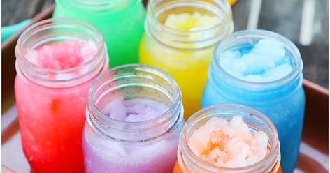 These icy colorful drinks are a breeze to make and you freeze them then drink them right out of mason jars! I used Torani syrup and with over 100 flavors the colors and fruity concoctions you can make are endless! Torani Drinks, Torani Syrup Recipes, Homemade Slushies, Torani Recipes, Popping Bubbles, Slushy Drinks, Rainbow Things, Torani Syrup, Rainbow Desserts