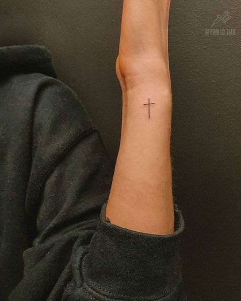 10 Best Dainty Cross Tattoo Ideas That Will Blow Your Mind! | Outsons | Men's Fashion Tips And Style Guides Dainty Cross Tattoo, Cross Tattoo Ideas, Cross Tattoo On Wrist, Small Cross Tattoos, Simple Cross Tattoo, Tiny Wrist Tattoos, Cross Tattoos For Women, Om Tattoo, Cross Tattoo Designs