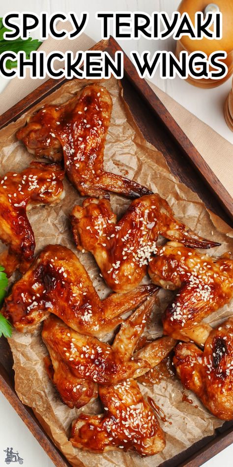 Chicken wings with a spicy Asian flavor. The sauce is spicy, sweet, salty and irresistible. This Teriyaki chicken wings are so good that you won't be able to stop at just one. The wings are fantastic made ahead for game day, any gathering, or just a delicious chicken dinner recipe . Spicy Teriyaki Chicken, Spicy Teriyaki Sauce, Teriyaki Wings, Teriyaki Chicken Wings, Chicken Dinner Recipe, Delicious Chicken Dinners, Spicy Wings, Grilled Chicken Recipes, Asian Flavors