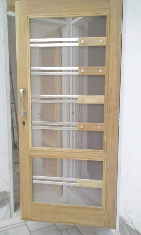 Mash Doors Design, Net Doors For Main Door Modern, Jalli Door Designs Modern, Jalli Doors Design, Jali Door Design Modern Interior, Jaali Door Design Wooden, Wooden Jali Door Design Modern, Front Jali Door Design, Net Door Design Wooden