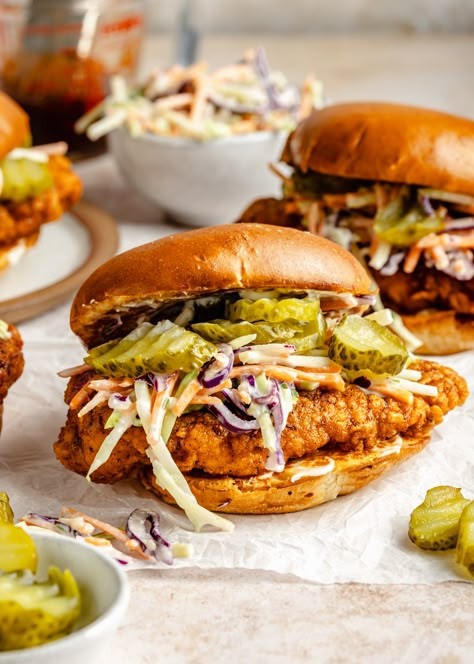 Nashville Hot Chicken Sandwiches are bursting with the most delicious spicy, slightly sweet flavor! Perfectly seasoned fried chicken with a super crunchy crust and juicy, moist center is coated in an irresistible hot sauce, served Nashville Hot Chicken Sandwich Sauce, Hot Honey Fried Chicken Sandwich, Nashville Fried Chicken Recipe, Nashville Chicken Sandwich, Intentional Eating, Nashville Hot Chicken Sandwich, Nashville Hot Chicken Recipe, Burger Board, Hot Chicken Recipe