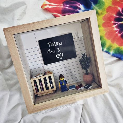 Every year, we create my son's teacher out of @lego and make her a little classroom in a shadow box. It's so fun to make, and the teachers always love it. His teacher this year has just been absolutely amazing, and we are so thankful for her. Swipe for details and some of our previous years. 💗 #teacherappreciationweek #teacherappreciation #teacherappreciationday #teacherappreciationgift #teacherappreciationideas #teachers #teachergifts #Lego #legominifigures #legogram #legoideas #legogift #... Lego Teacher, Lego Gifts, Teacher Appreciation Week, So Thankful, Previous Year, Lego Minifigures, Teacher Appreciation Gifts, Teacher Appreciation, Shadow Box