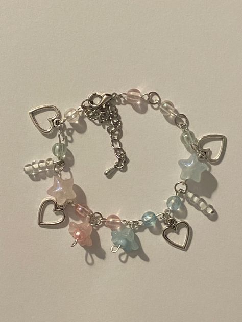 #bracelet#stars#heart#charm#charms#flower#pink#blue#pinkstars#bluestars Pink And Blue Bracelets, Y2k Bracelets, Pink Charm Bracelet, Star Charm Bracelet, Pink Beaded Bracelets, Bracelet With Charms, Bracelet Inspo, Blue Beaded Bracelets, Bracelet Heart