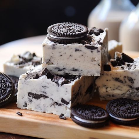 Are you thinking of making an easy holiday dessert? Then this recipe will give you exactly that. This three-ingredient Oreo Fudge is super easy with condensed milk, white chocolate, and Oreo cookies. As they are high in calories, they are incredibly tasty! You will thank me for this chocolate-covered Oreo Fudge when you taste it. Don't hesitate to leave a comment if you still have any questions.   WHAT DO YOU NEED TO MAKE OREO FUDGE? To make an Oreo dessert recipe, three ingredients are ... Oreo Fudge Recipe, Easy Microwave Fudge, Homemade Oreo Cookies, Easy Holiday Dessert, White Chocolate Oreos, Types Of Cookies, Oreo Dessert Recipes, Microwave Fudge, White Chocolate Fudge